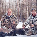 happy pair of deerhunters